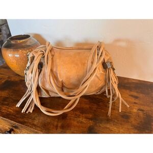 JLO camel color leather small shoulder bag with zipper and tassels
